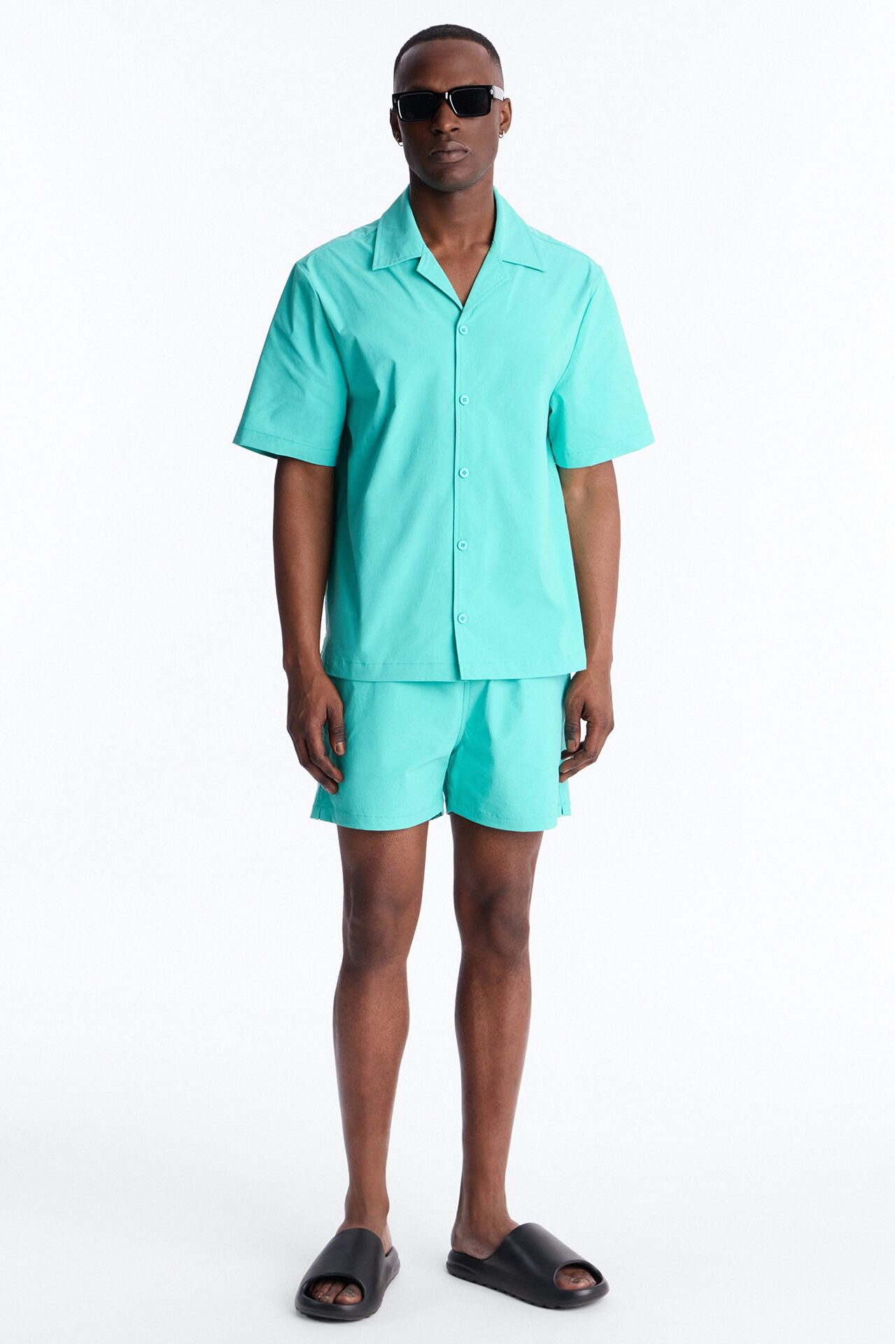 Montez Stretch Swim Trunk 4″ - Teal
